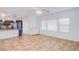 Bright living space with tile flooring, dark cabinets, granite countertops, and recessed lighting at 1794 Morro Vista Dr, Las Vegas, NV 89135