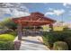 Charming community pavilion with picnic tables, perfect for outdoor gatherings and events at 1794 Morro Vista Dr, Las Vegas, NV 89135