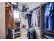 Organized walk-in closet with shelving and hanging rods offers ample storage space at 1794 Morro Vista Dr, Las Vegas, NV 89135