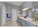 Bathroom featuring dual sinks and a mirror at 1809 Solana Del Norte Way, North Las Vegas, NV 89031