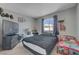 Cozy bedroom with plush carpeting and natural light at 1809 Solana Del Norte Way, North Las Vegas, NV 89031