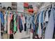 Walk-in closet with shelving, clothing racks, and plenty of storage space at 1809 Solana Del Norte Way, North Las Vegas, NV 89031