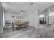 Inviting dining area bathed in natural light, seamlessly connecting the living space at 1809 Solana Del Norte Way, North Las Vegas, NV 89031
