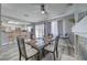 Cozy dining area adjacent to the kitchen, filled with natural light from the large windows at 1809 Solana Del Norte Way, North Las Vegas, NV 89031
