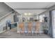 Bright eat-in kitchen features bar seating and stainless appliances at 1809 Solana Del Norte Way, North Las Vegas, NV 89031