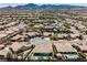 A desert home with a private pool in a serene community surrounded by mountains at 2177 Magnolia Pond Ct, Henderson, NV 89052
