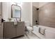 Stylish bathroom features gray vanity, sleek fixtures, and subway tile surround at 2177 Magnolia Pond Ct, Henderson, NV 89052