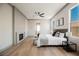 Comfortable main bedroom featuring modern fixtures, fireplace, and great natural light at 2177 Magnolia Pond Ct, Henderson, NV 89052