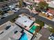 Aerial view of the house showing diving pool in backyard, and roof, located on a corner lot at 2211 Frontier Ave, Las Vegas, NV 89106