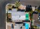 Aerial view of home with diving pool and roof, located in quiet neighborhood on corner lot at 2211 Frontier Ave, Las Vegas, NV 89106