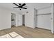 Bedroom with modern flooring, ceiling fan, access to bathroom, and closet at 2211 Frontier Ave, Las Vegas, NV 89106