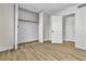 Bright bedroom with modern flooring and a closet for storage at 2211 Frontier Ave, Las Vegas, NV 89106