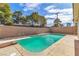 Large backyard pool features a diving board and ladder for outdoor enjoyment at 2211 Frontier Ave, Las Vegas, NV 89106