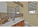 Well-lit bathroom with modern vanity, and neutral color scheme at 2382 Sunburst View St, Henderson, NV 89052