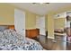 Cozy bedroom with wood floors, and closet at 2382 Sunburst View St, Henderson, NV 89052