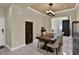 Spacious dining room features a dining table with seating for eight and a neutral wall color at 2382 Sunburst View St, Henderson, NV 89052