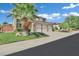 Beautiful two-story home with a three-car garage, lawn, and drought tolerant landscaping at 2382 Sunburst View St, Henderson, NV 89052