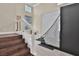 Modern game room features stair access and golf simulator and neutral wall colors at 2382 Sunburst View St, Henderson, NV 89052