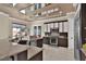Modern kitchen design with stainless steel appliances, granite countertops, and ample cabinet space at 2382 Sunburst View St, Henderson, NV 89052