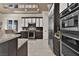 Well-equipped kitchen boasts stainless steel appliances and modern design at 2382 Sunburst View St, Henderson, NV 89052
