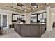 Spacious kitchen island with stainless steel appliances and modern cabinetry with adjacent breakfast nook seating at 2382 Sunburst View St, Henderson, NV 89052
