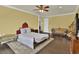 Bright main bedroom with hardwood floors, sitting area at 2382 Sunburst View St, Henderson, NV 89052