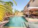 Sparkling backyard pool with an in-ground spa and shaded pergola for outdoor entertaining at 2382 Sunburst View St, Henderson, NV 89052
