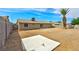 Spacious backyard with a large concrete slab and block wall perimeter at 239 Concho Dr, Henderson, NV 89015
