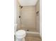 Tiled walk-in shower features sleek fixtures and a shower niche at 239 Concho Dr, Henderson, NV 89015
