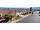 Charming single-story home with low-maintenance desert landscaping, tile roof, and attached two-car garage at 240 Vineyard Ln, Mesquite, NV 89027