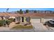 Inviting single-story home featuring a well-maintained yard, desert landscaping, and a two-car garage at 240 Vineyard Ln, Mesquite, NV 89027