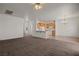 Open concept living room showcasing tile flooring in the kitchen and bar seating at 240 Vineyard Ln, Mesquite, NV 89027