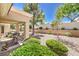 Charming backyard with patio and desert landscaping at 2509 Banora Point Dr, Las Vegas, NV 89134