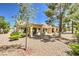 Backyard featuring desert landscaping, patio, and exterior views of the house at 2509 Banora Point Dr, Las Vegas, NV 89134