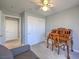 Bedroom with a wooden desk with ornate legs, next to a closet and a doorway at 2509 Banora Point Dr, Las Vegas, NV 89134