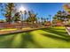Well-maintained bocce ball court set in a park-like setting with benches, and mature trees at 2509 Banora Point Dr, Las Vegas, NV 89134