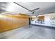 Spacious garage with ample storage cabinets, laundry, and concrete flooring at 2509 Banora Point Dr, Las Vegas, NV 89134