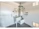Garage with utility sink and water heater at 2509 Banora Point Dr, Las Vegas, NV 89134