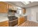 Kitchen features stainless steel appliances and light wood cabinetry at 2509 Banora Point Dr, Las Vegas, NV 89134