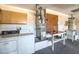Functional laundry area with washer, dryer, utility sink, and storage options at 2509 Banora Point Dr, Las Vegas, NV 89134