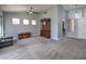 Spacious living room with new carpet, ceiling fan, and lots of natural light at 2509 Banora Point Dr, Las Vegas, NV 89134