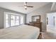 Main bedroom features bay window, carpet flooring, and dark wood dresser at 2509 Banora Point Dr, Las Vegas, NV 89134