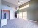 Bright bedroom with high ceilings, ceiling fan and neutral carpet at 2521 Seascape Dr, Las Vegas, NV 89128