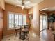Charming kitchen area with seating, plantation shutters offering privacy and light control, with indoor plants at 2521 Seascape Dr, Las Vegas, NV 89128