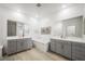 Spacious bathroom with dual vanities, a soaking tub, and modern finishes at 2555 Hampton Rd # 9307, Henderson, NV 89052