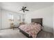 Bright bedroom features a ceiling fan, natural light, and neutral decor at 2555 Hampton Rd # 9307, Henderson, NV 89052