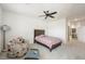 Bright bedroom features a ceiling fan, natural light, and neutral decor at 2555 Hampton Rd # 9307, Henderson, NV 89052