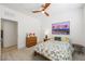 Well-lit bedroom with neutral colors, wood furniture, and tasteful decor at 2555 Hampton Rd # 9307, Henderson, NV 89052