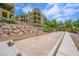 Enjoy an outdoor bocce ball court adjacent to meticulously landscaped common areas near the apartment buildings at 2555 Hampton Rd # 9307, Henderson, NV 89052