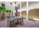 Outdoor area featuring patio furniture in a courtyard surrounded by architecture at 2555 Hampton Rd # 9307, Henderson, NV 89052
